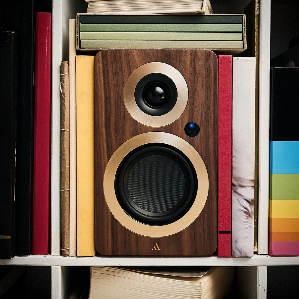 Argon Audio Forte A4 WiFi active bookshelf speakers showing front view with black speaker grille and wooden sides.
