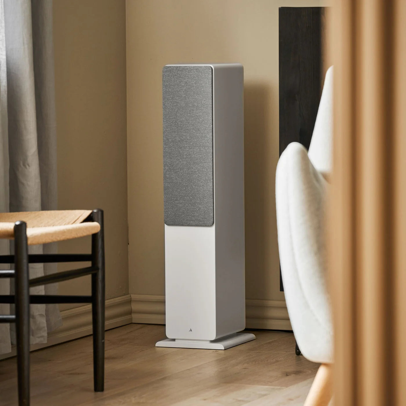 Argon Audio Forte A55 MK2 floorstanding speakers with white finish, showcasing sleek design and ample speaker drivers.