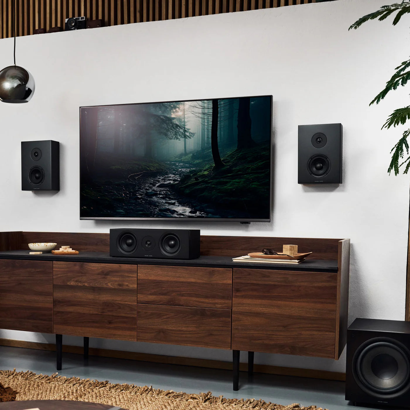 Black Argon Audio Forus Center speaker with sleek design and front-facing speaker grille, ideal for home theater audio setup.