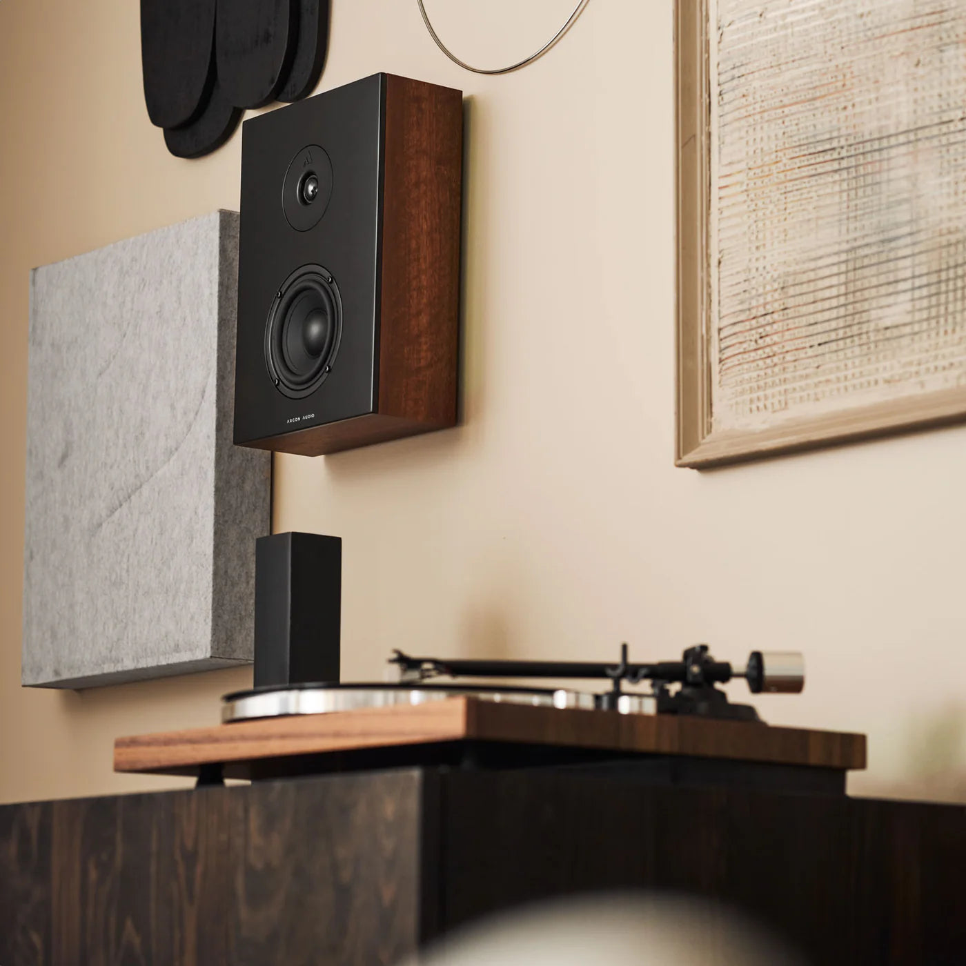 Argon Audio Forus 4 Wall in-wall and outdoor speaker mounted on wall with black grille and weather-resistant design.