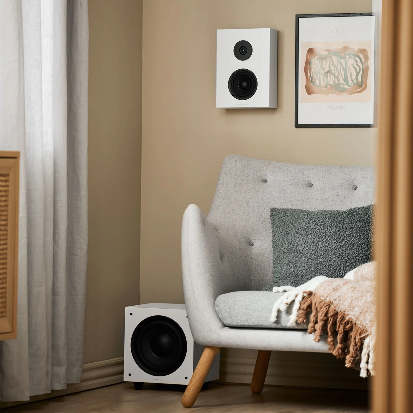 Argon Audio Forus 4 wall in-wall and outdoor speakers, white finish, with multiple speakers and mounting brackets visible.