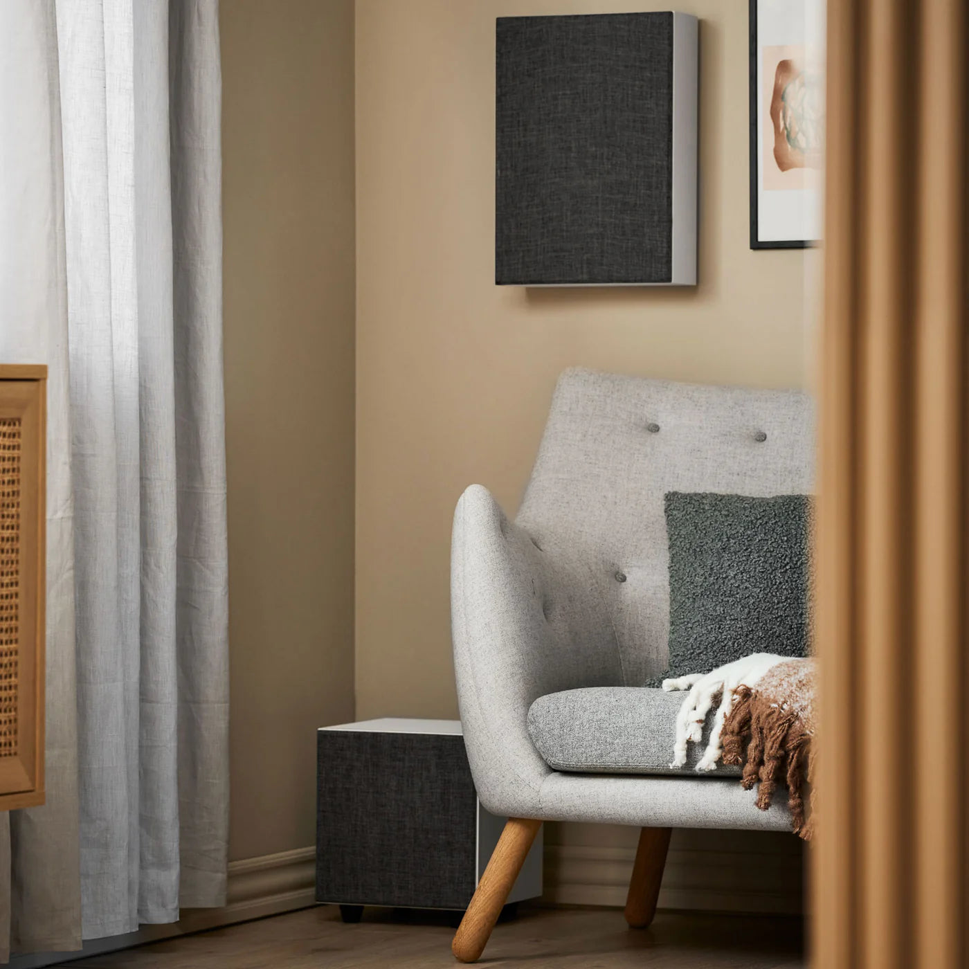 Argon Audio Forus 5 wall-mounted in-wall and outdoor speakers with white enclosures, designed for seamless indoor or outdoor audio.