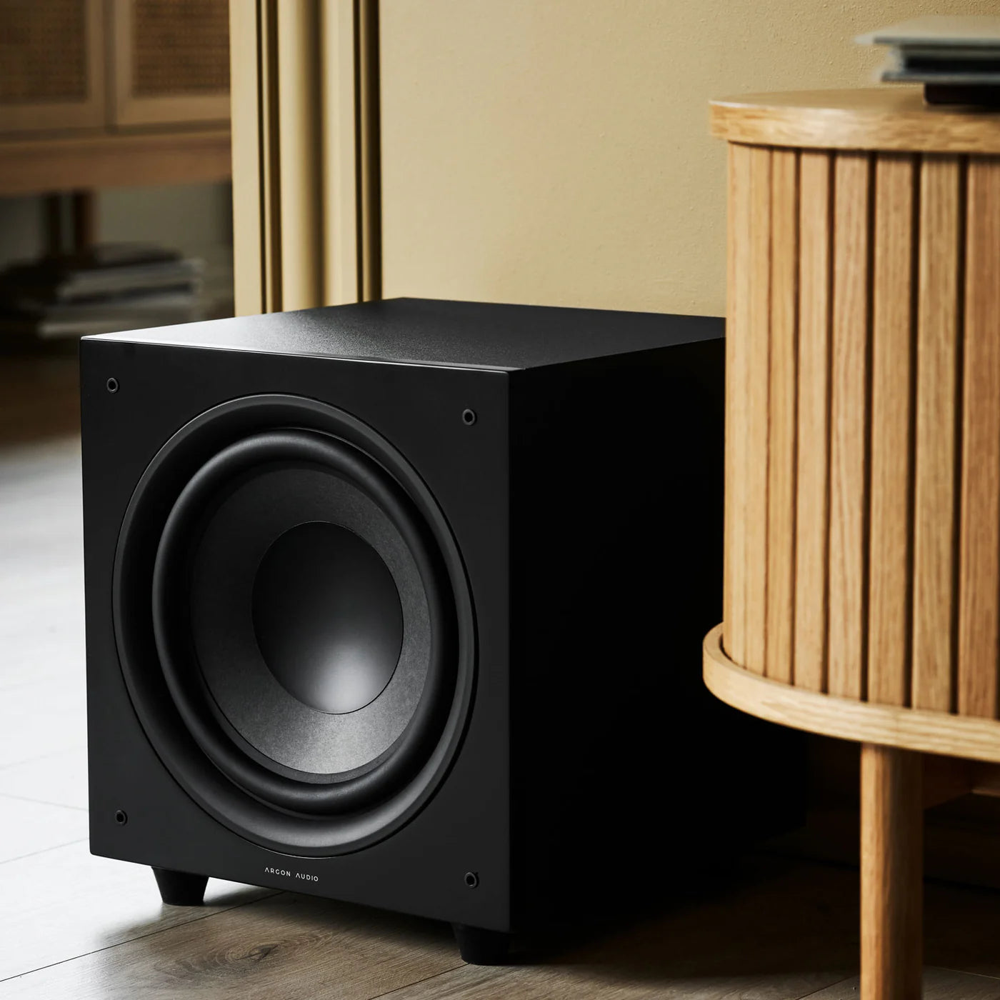 Black Argon Audio Malmö Sub 10 subwoofer with sleek design and control panel, showcasing its compact size and sturdy build.