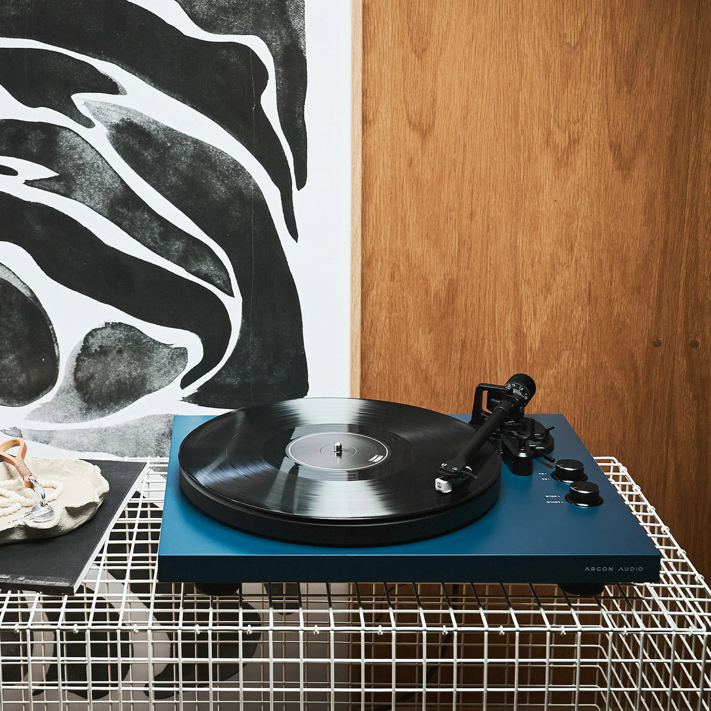 Black Argon Audio TT MK2 turntable with tonearm and platter, showcasing sleek design and controls for high-quality vinyl listening.