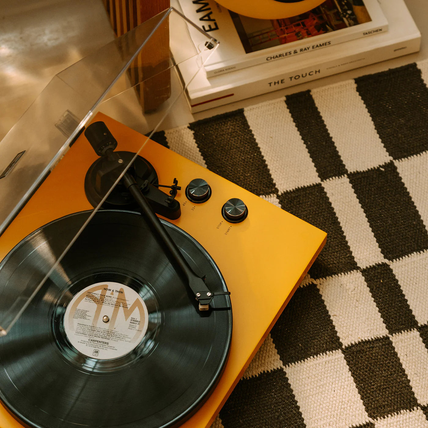 Argon Audio TT MK2 turntable with wooden plinth and silver tonearm, close-up view of the sleek audio equipment.