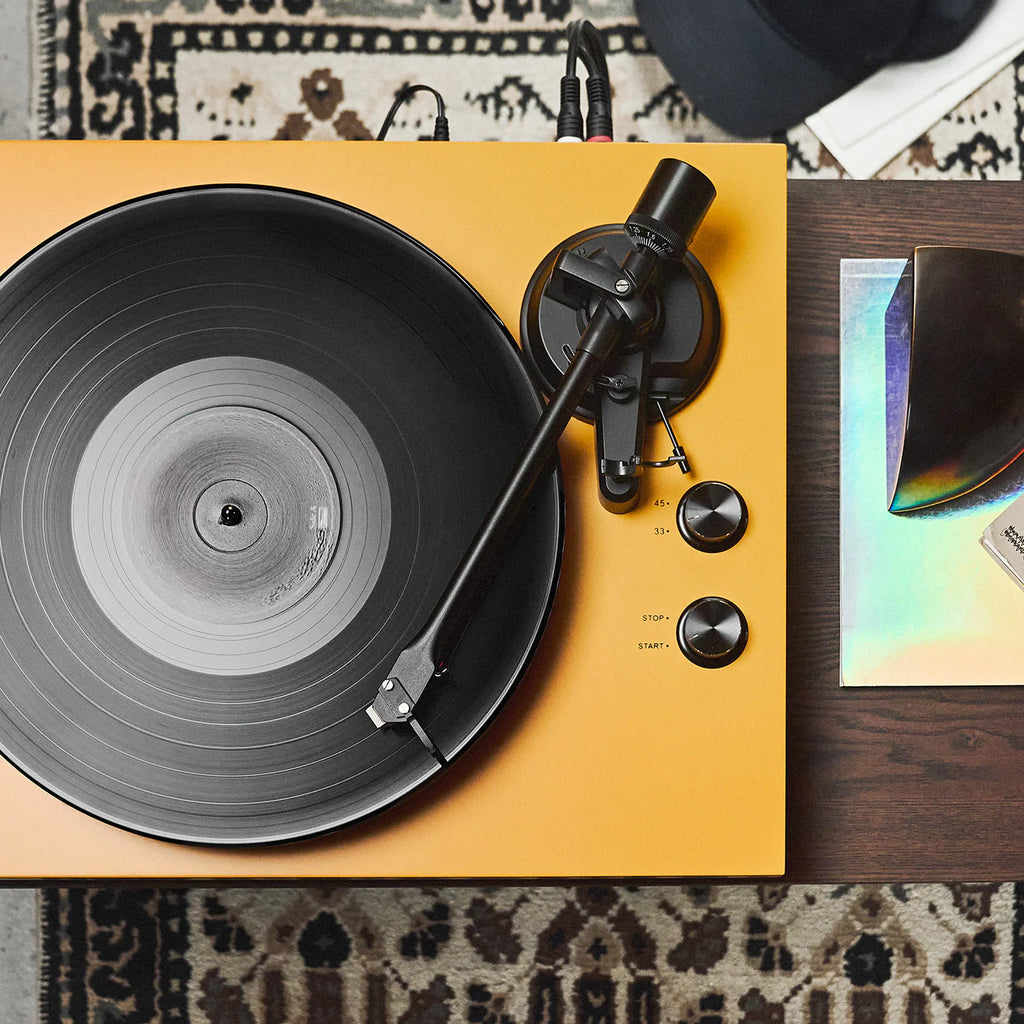 Argon Audio TT MK2 turntable with a sleek black finish and aluminum tonearm, showcasing its modern design and control features.