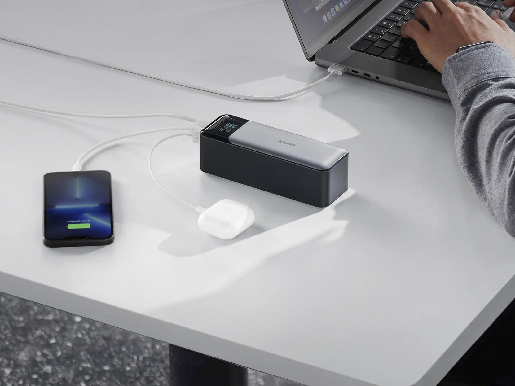 Anker 737 PowerCore 24K portable power bank with dual USB-C ports and LCD display for fast device charging.