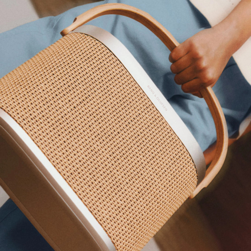 Bang & Olufsen Beosound A5 portable speaker with sleek design and fabric covering, ideal for high-quality sound in stylish home setups