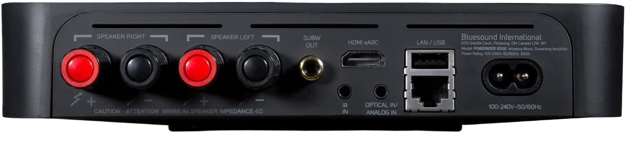 Bluesound Powernode Edge music streamer in black, featuring sleek design and control buttons on the front panel.