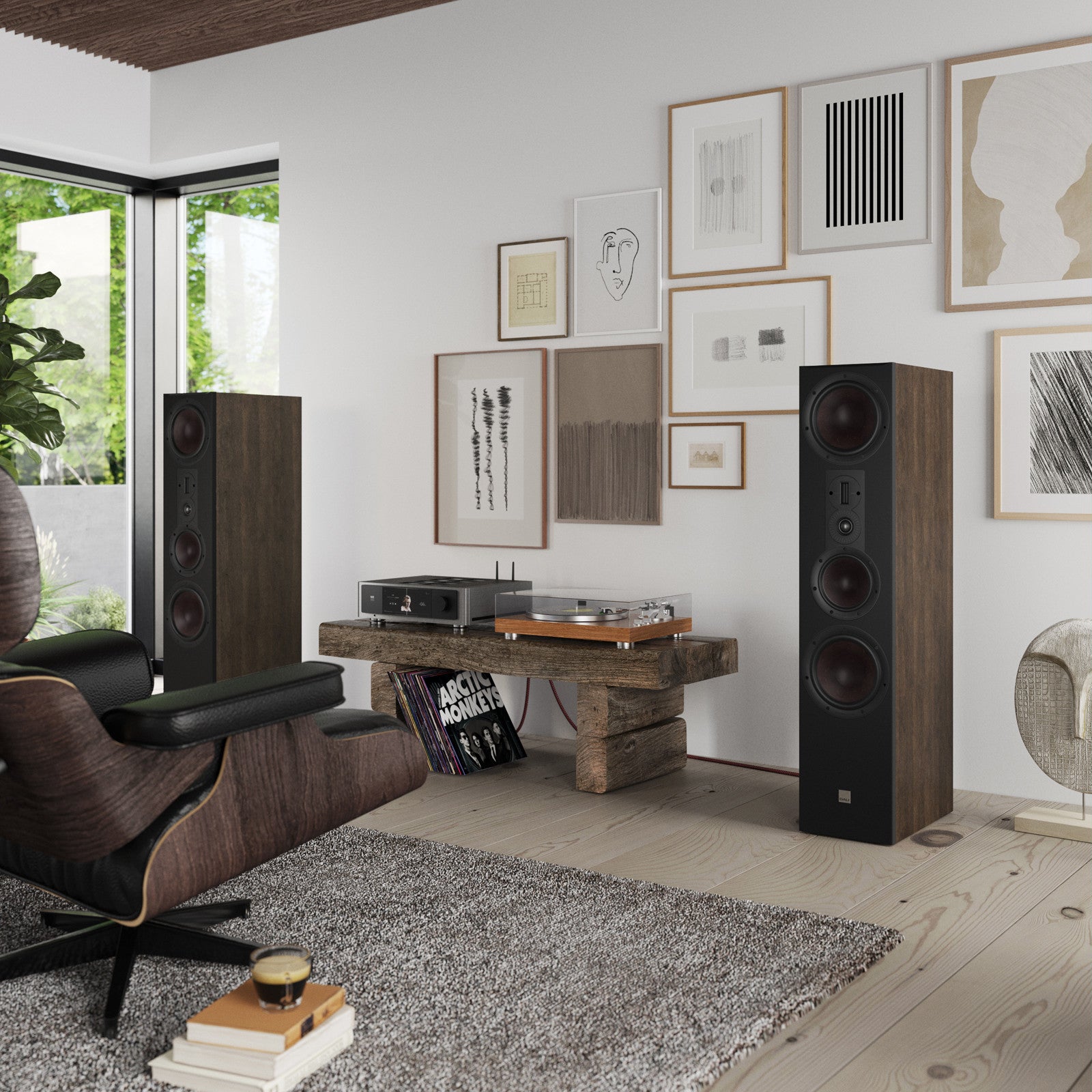 DALI Opticon 8 MK2 passive floorstanding speakers shown in a stylish living room setting, highlighting their sleek design and wood finish.