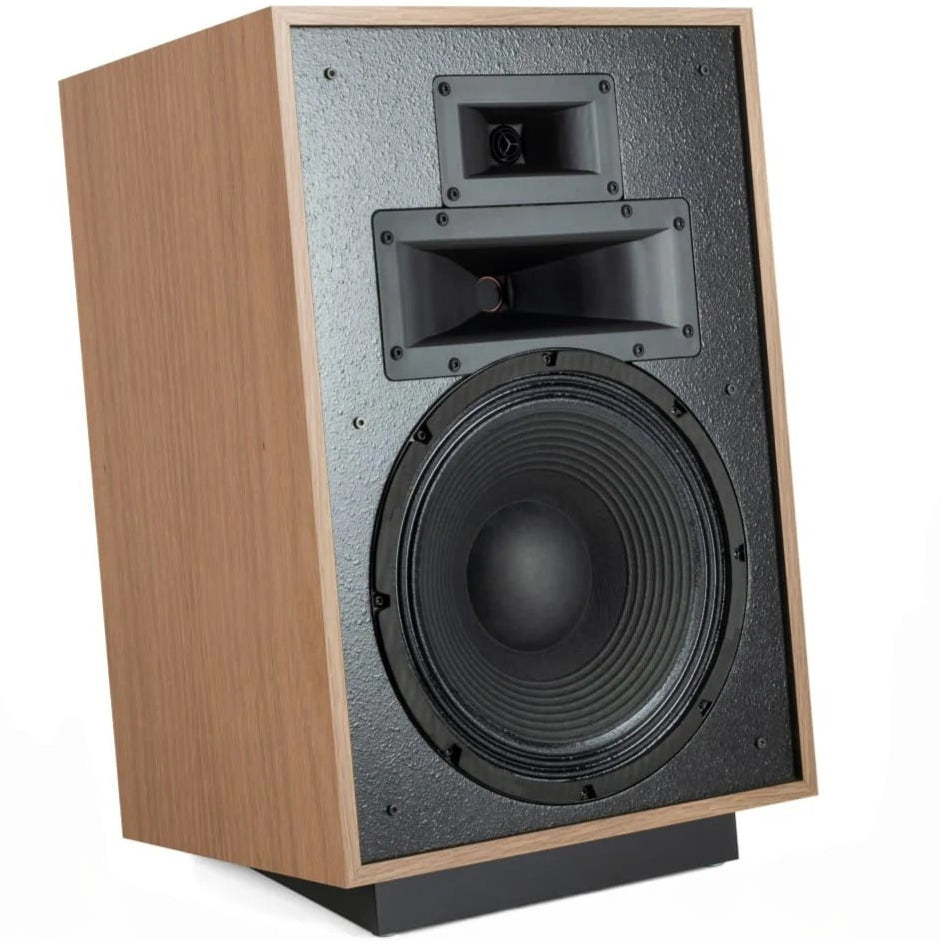 Klipsch Heresy IV floorstanding speakers with black finish and horn-loaded tweeters, showcasing a sleek, modern design.