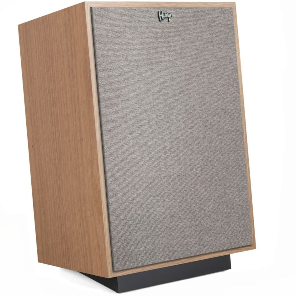 Klipsch Heresy IV floorstanding speakers showing sleek black cabinets and detailed speaker drivers.