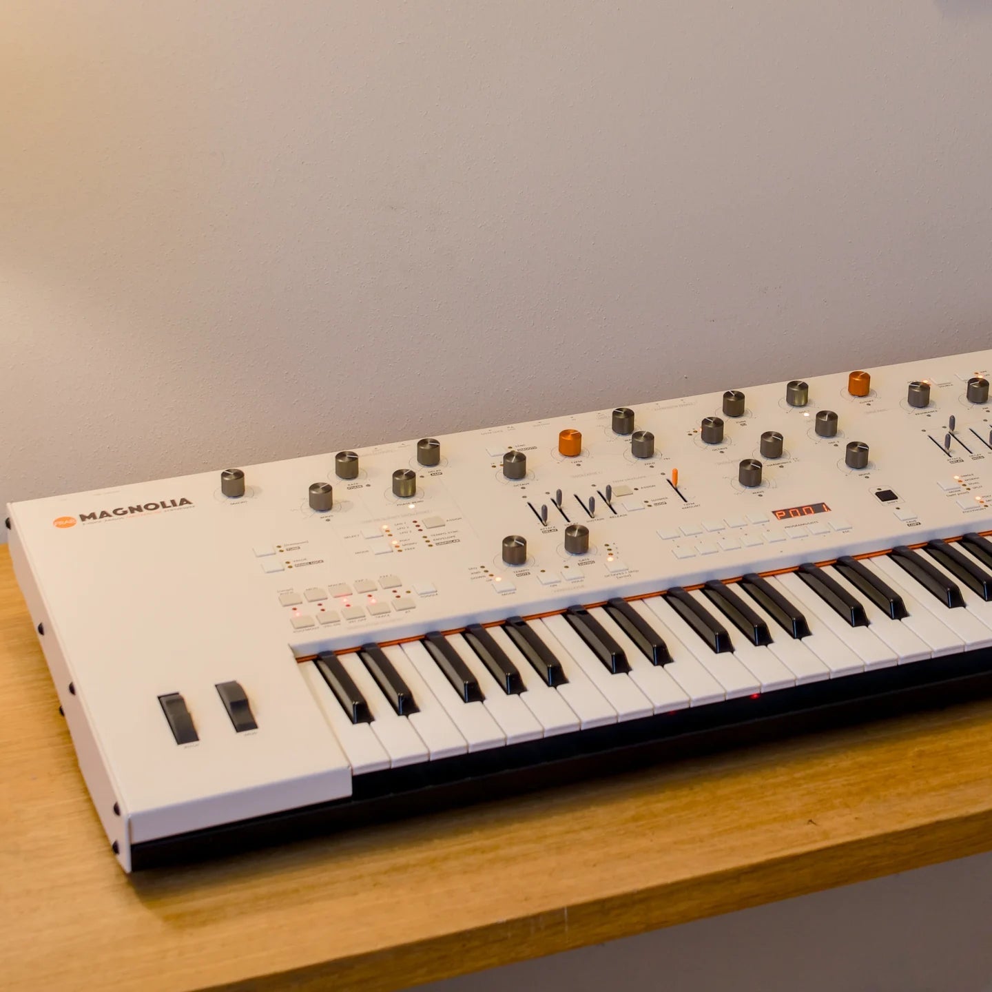 Side view of the Frap Tools Magnolia keyboard synthesizer showing its sleek design and control interface.