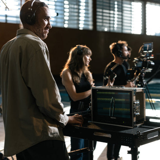 Group of nine Hollyland Solidcom SE Pro wireless headsets for video production communication accessories.