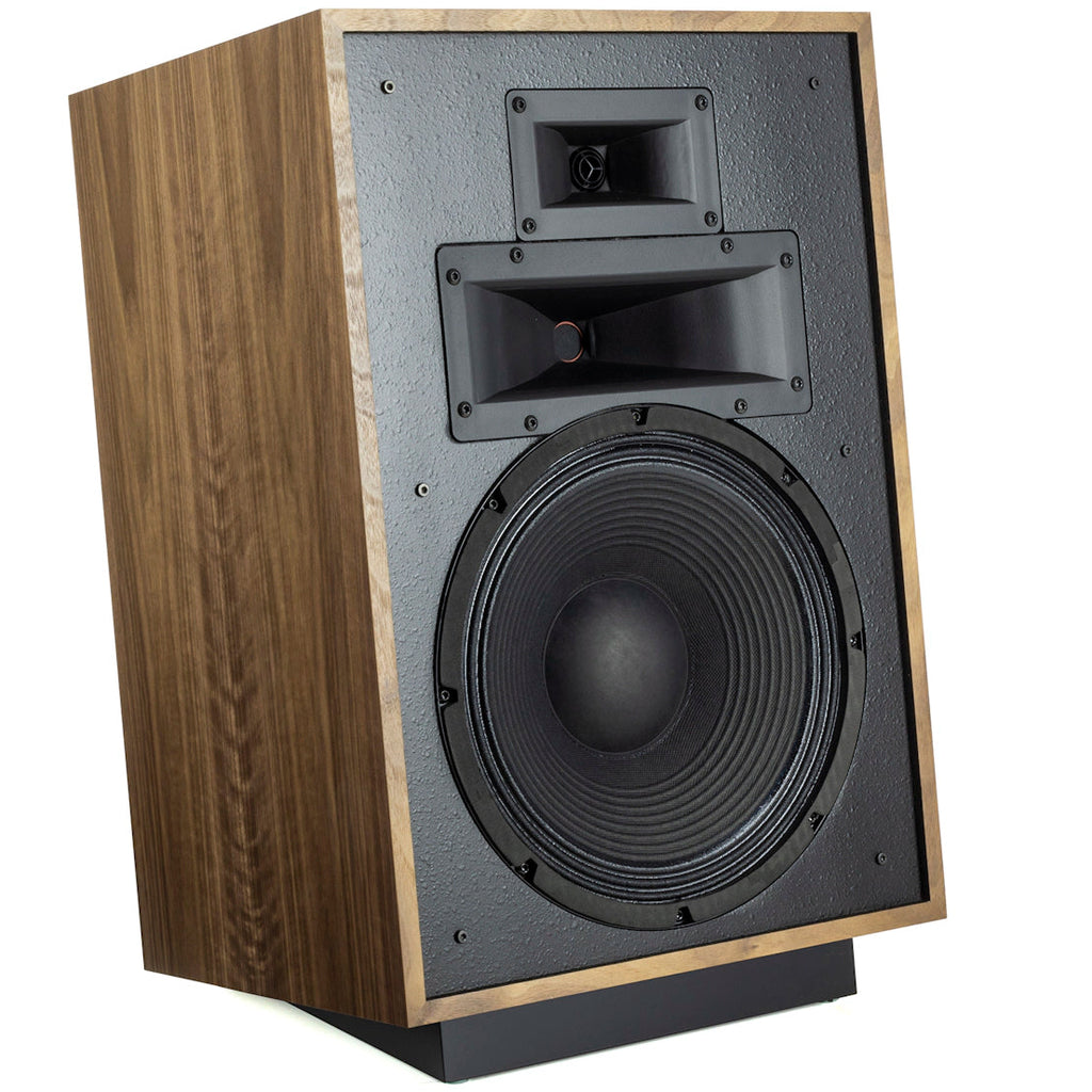 Right view of Klipsch Heresy IV floorstanding speakers in American Walnut finish, showcasing their elegant design and wood grain.