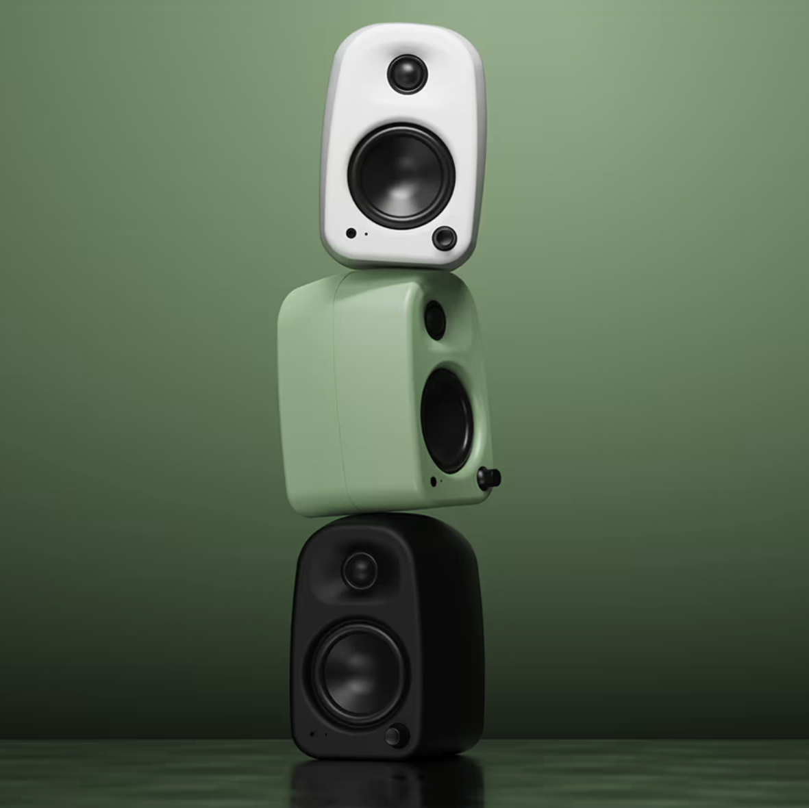 Kanto Audio UKI desktop speakers in black with sleek design and control knobs, ideal for computer or desktop audio setup.