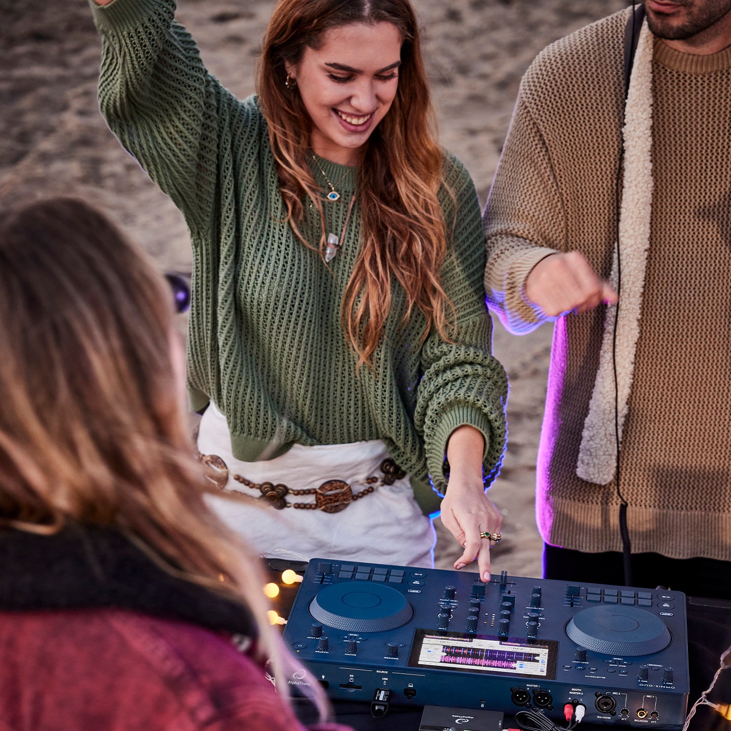 AlphaTheta Omnis-Duo DJ media players with dual turntables and advanced controls, shown with illuminated displays and professional audio features.