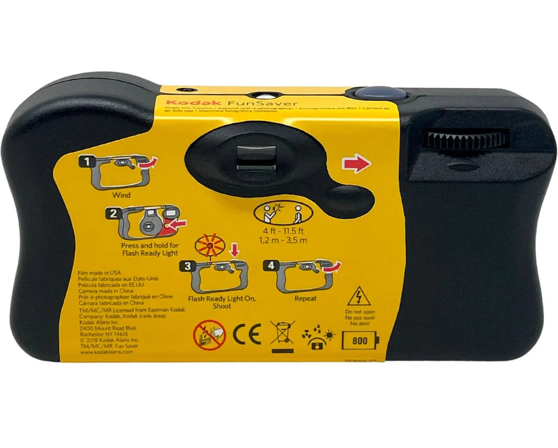 Kodak FunSaver 27+12 disposable camera with compact design and viewfinder, ideal for instant photography and outdoor use.