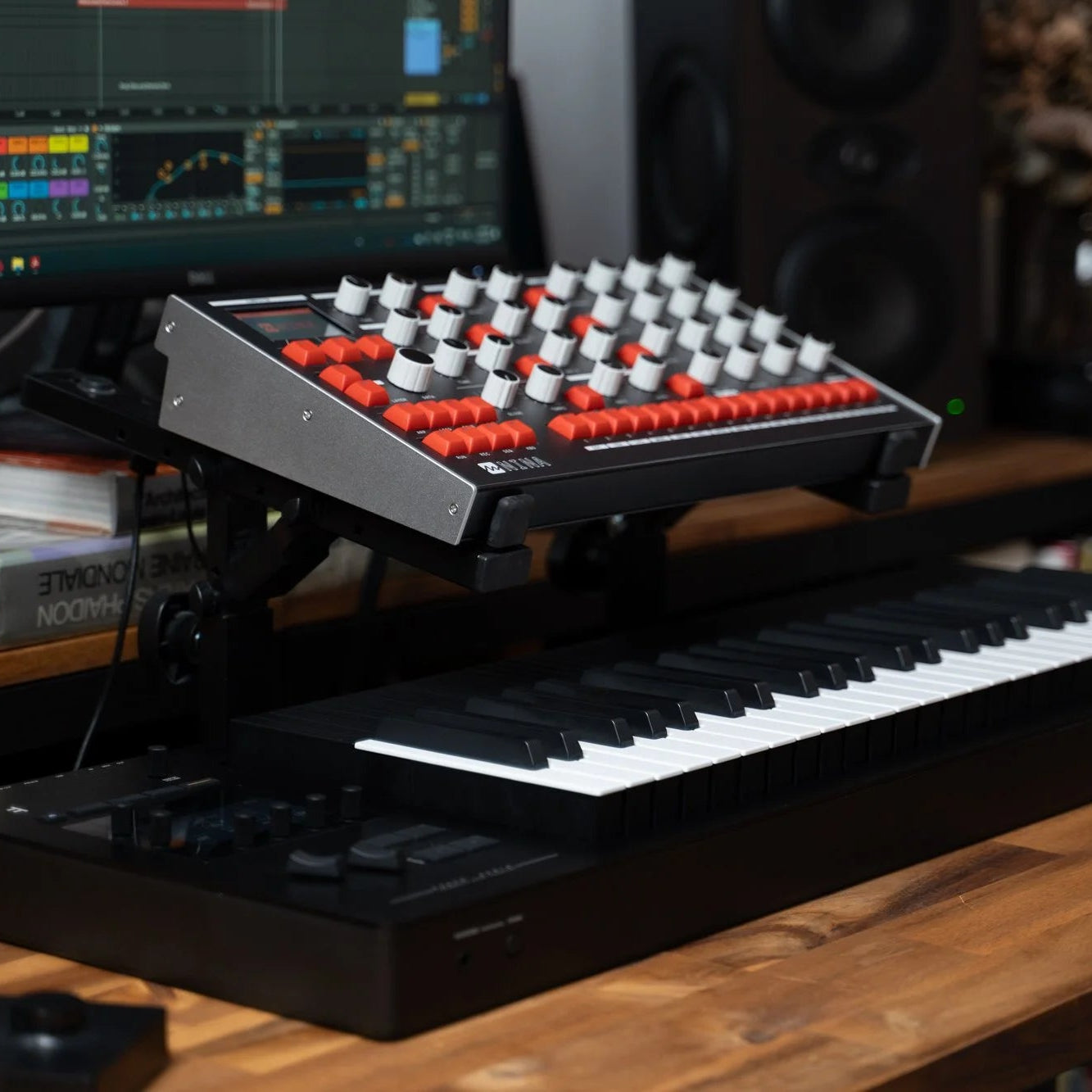 Melbourne Instruments Nina semi-modular synthesizer with multiple patch points and colorful interface controls.