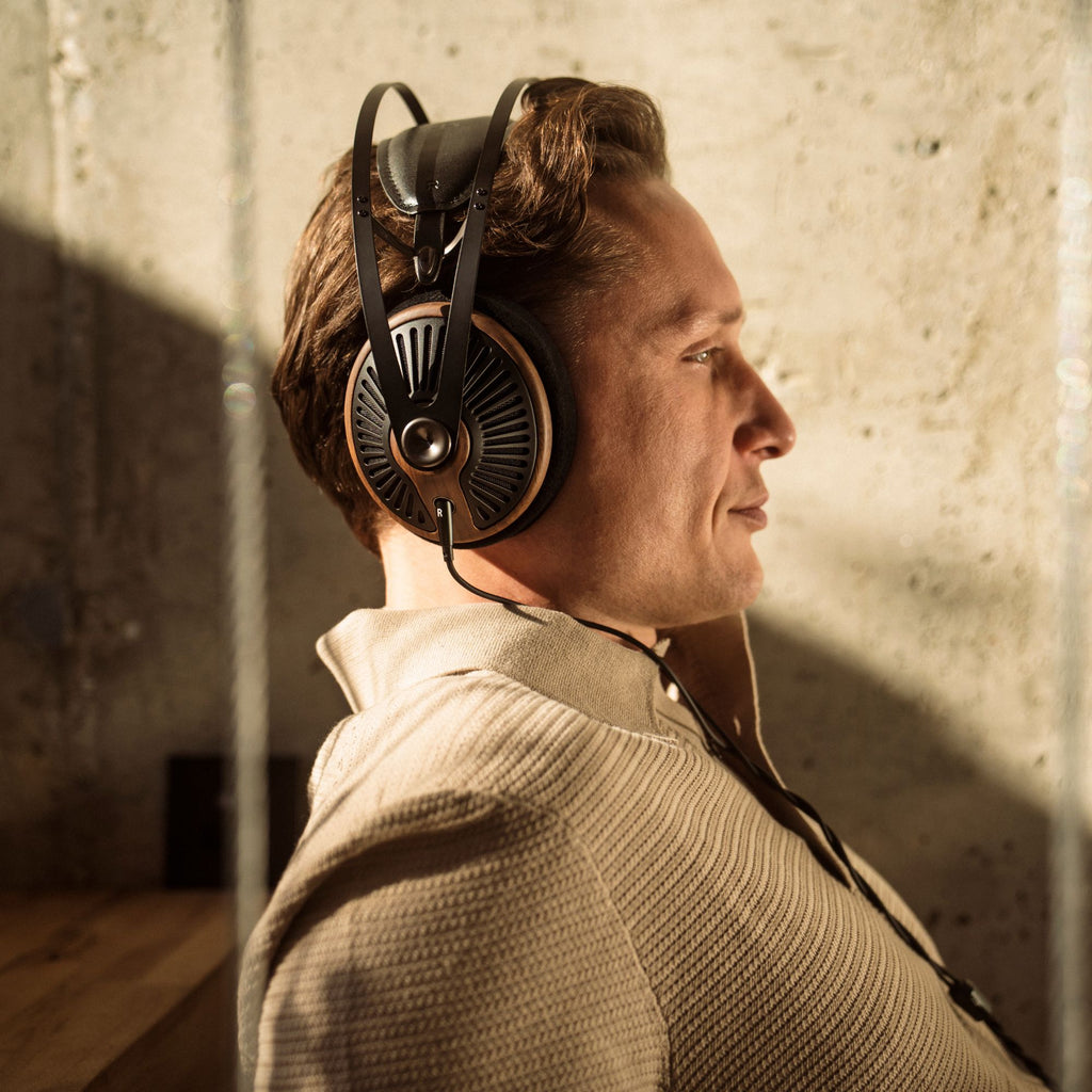 Wired Meze Audio 105 SILVA headphones with sleek design, over-ear style, and cushioned ear cups for comfortable listening.