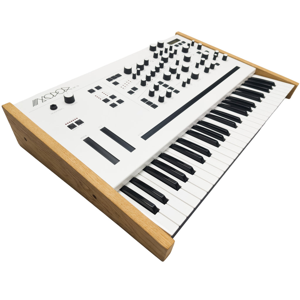 Modor NF-1k keyboard synthesizer with knobs, buttons, and a small display, showcasing its compact design and control panel.