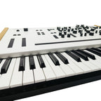 Modor NF-1k keyboard synthesizer with compact design, multiple control knobs, and OLED display for versatile sound creation.