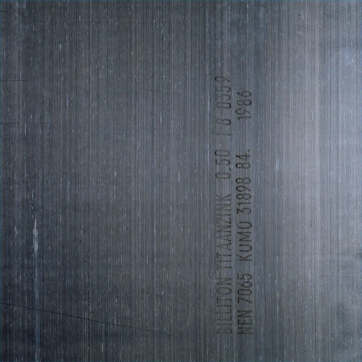 Black vinyl LP cover of New Order's Brotherhood album, featuring the band's artwork and album title in bold text.