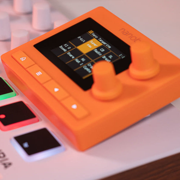 1010music Nanobox Tangerine drum machine with colorful interface and control knobs, designed for electronic music production.