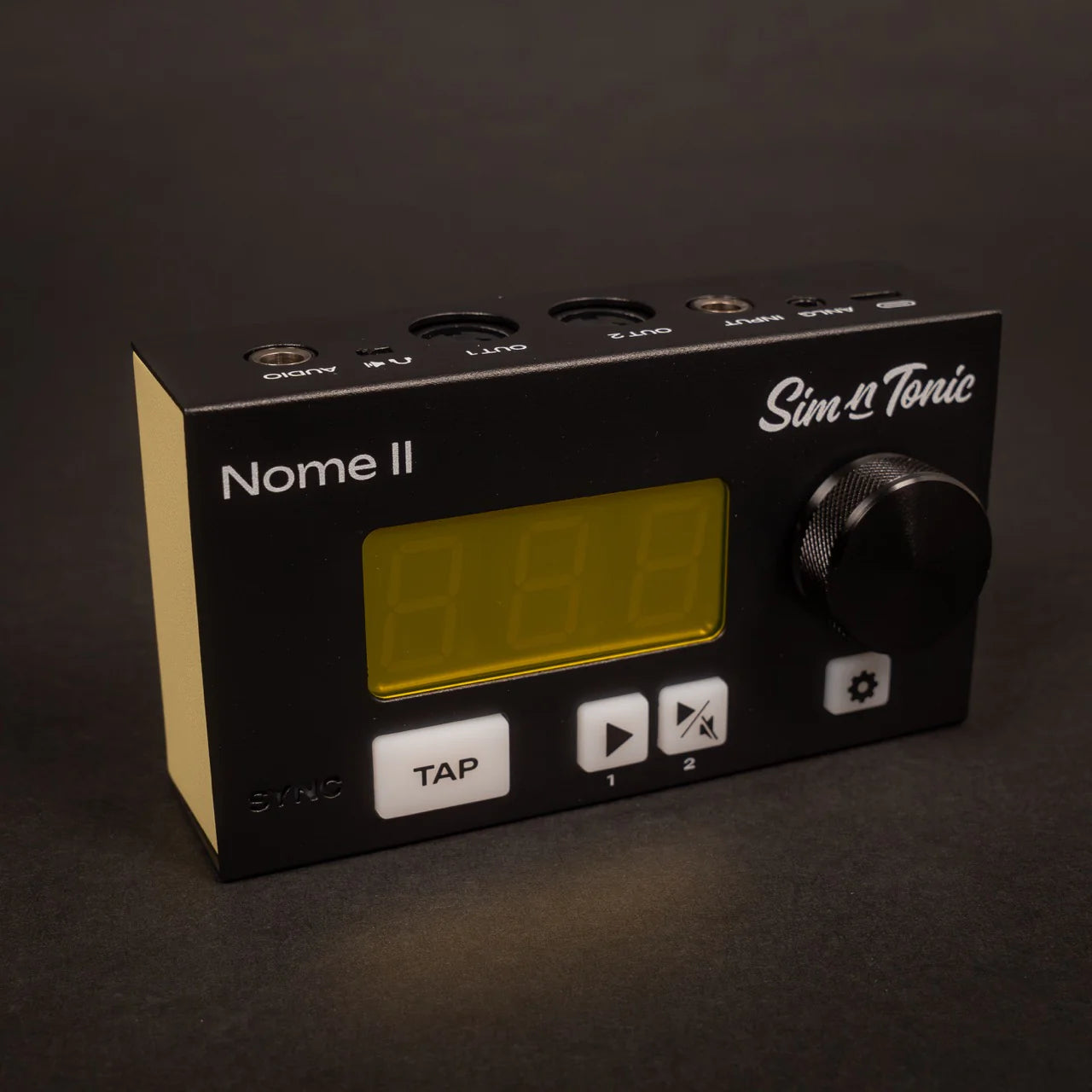 Front view of Sim'n Tonic Nome II MIDI interface, compact device with input and output ports for music production.