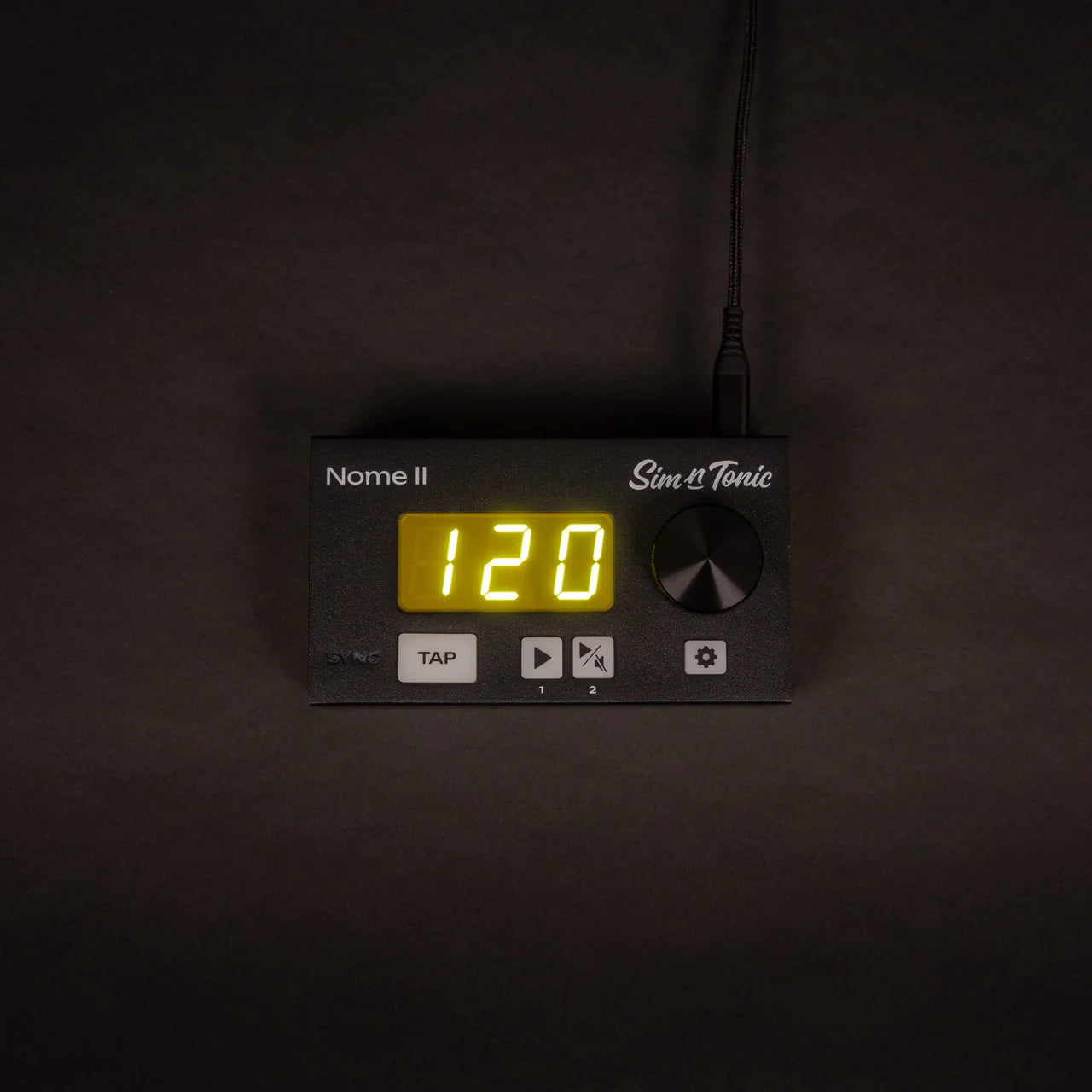 Top view of the Sim'n Tonic Nome II MIDI interface showing its compact design and multiple connection ports.