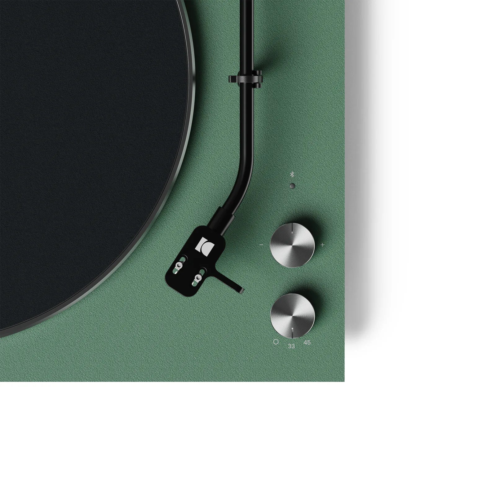 Close-up of the Kanto Audio OBI3 turntable's control knob, showcasing its sleek design and matte finish.