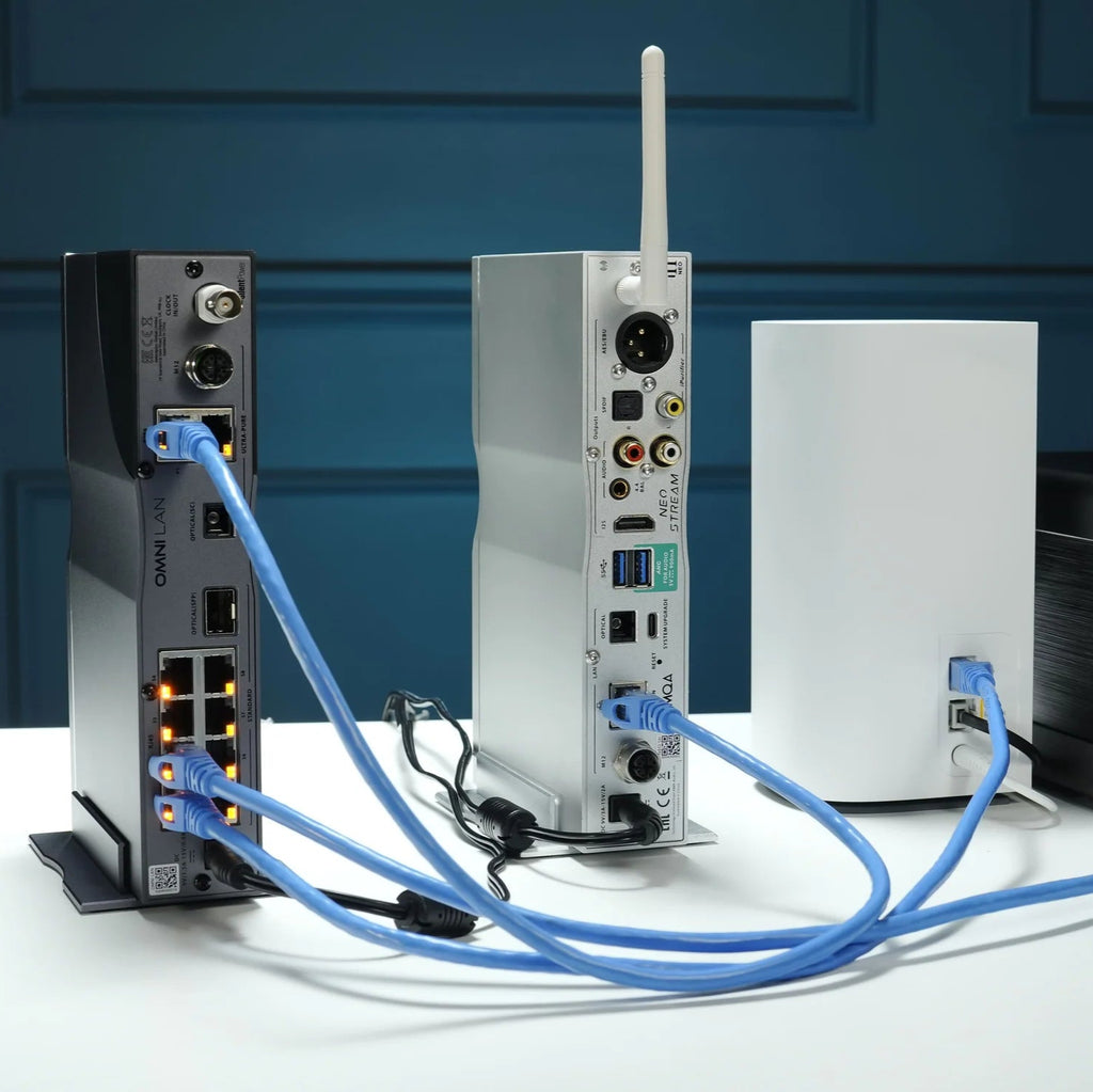 SilentPower OMNI LAN noise filter connected to network device, reducing electrical interference for improved internet performance.