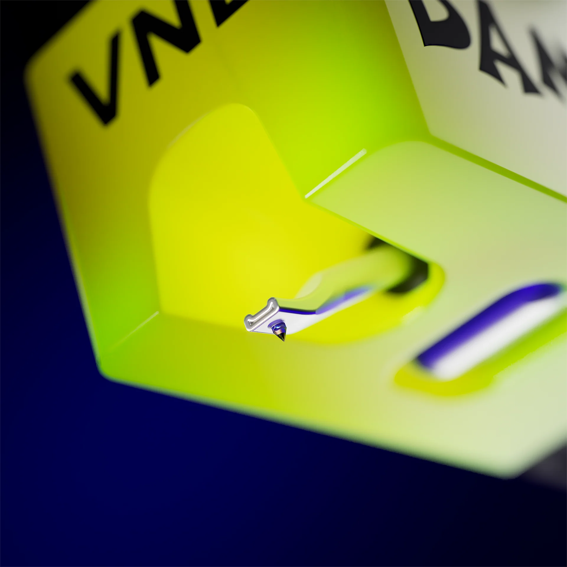 Bottom view of the Ortofon VNL DANCE turntable cartridge stylus, showcasing the stylus tip and cartridge body.