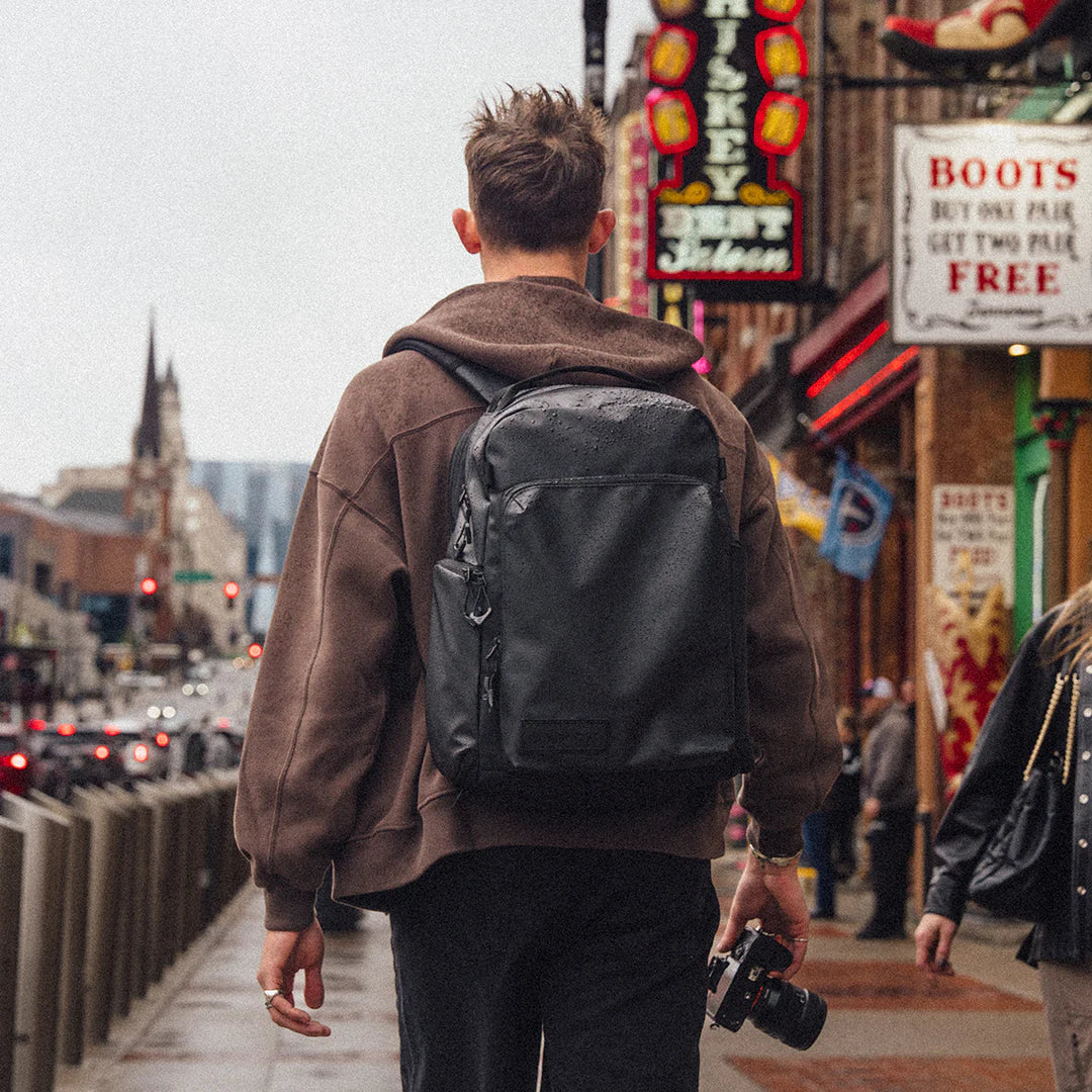 Black Wandrd PRVKE Pocket video equipment bag with compact design and adjustable strap, suitable for storing cameras and accessories.