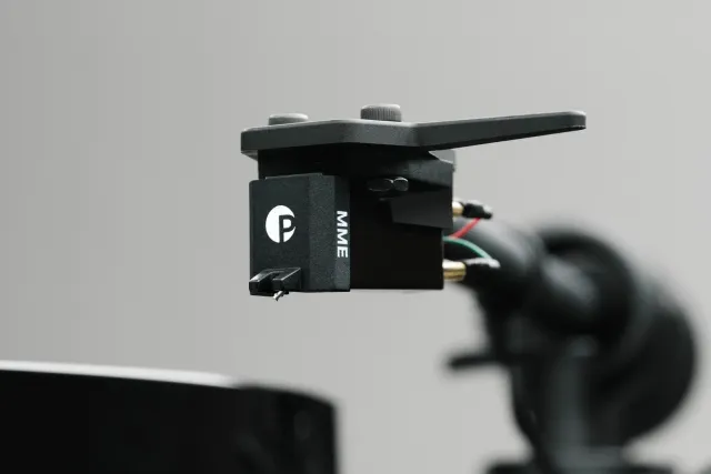 Pro-Ject E1.2 turntable with sleek design and tonearm, showcasing its stylish, modern look for high-quality vinyl listening.
