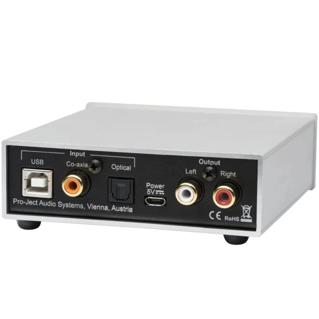 Pro-Ject Pre Box S2 Digital Edition 23 headphone amplifier and DAC, compact silver device with input and output ports.