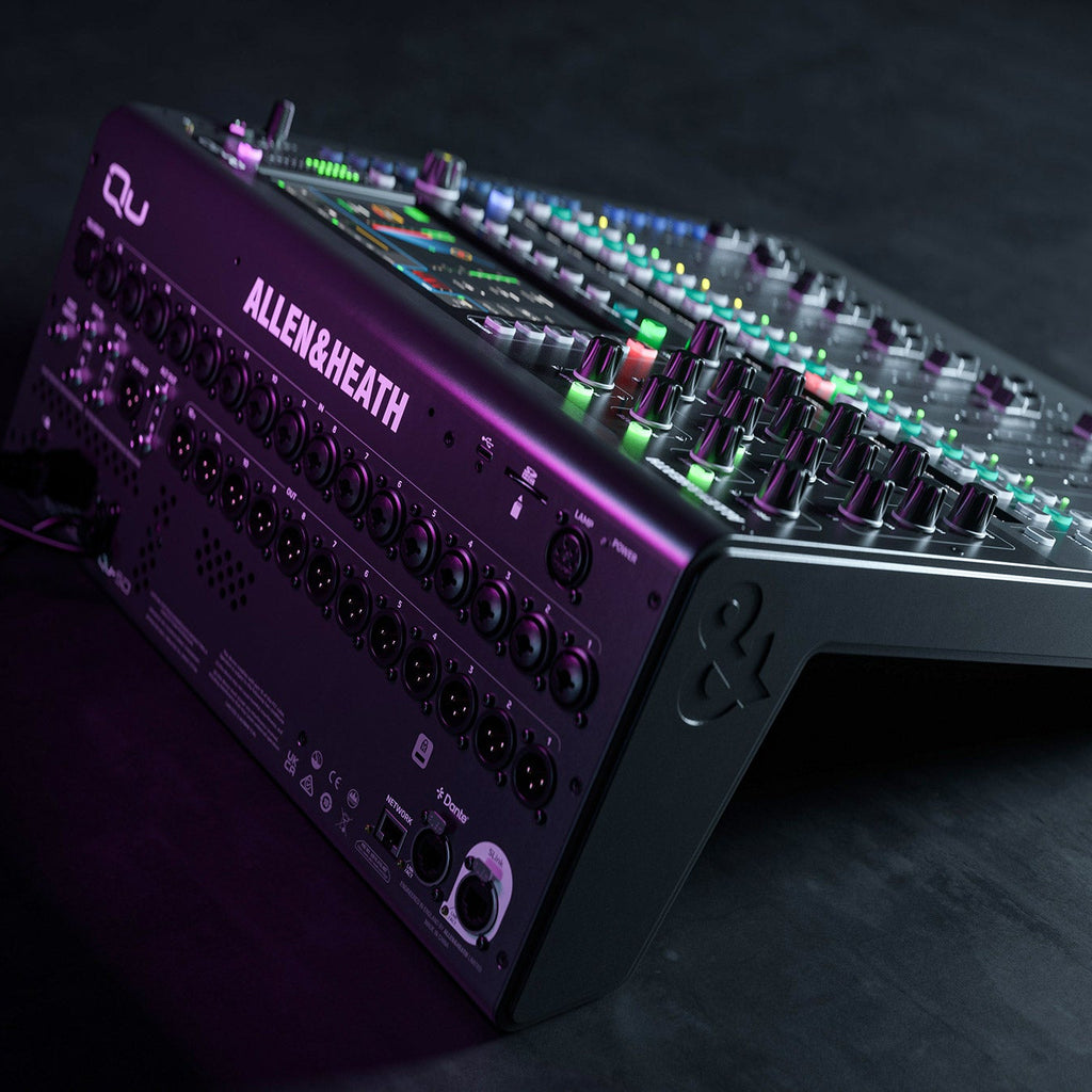 Allen & Heath Qu-6 digital mixer with touchscreen display, multiple knobs, and input channels for professional audio mixing.