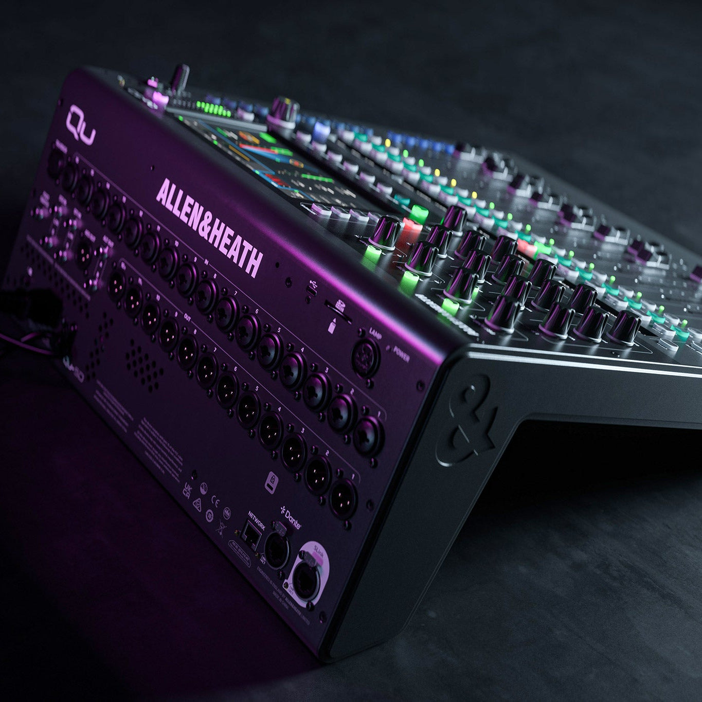 Allen & Heath Qu-6 digital mixer with touchscreen display, multiple knobs, and input channels for professional audio mixing.