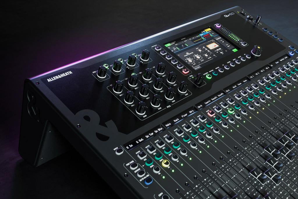 Allen & Heath Qu-6D digital mixer with touchscreen interface and multiple input controls in a professional audio setup.