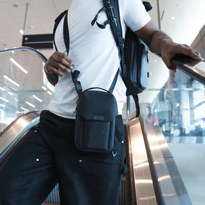 Wandrd X1 Cross Body video equipment bag with padded compartments and adjustable strap, designed for portable gear storage.