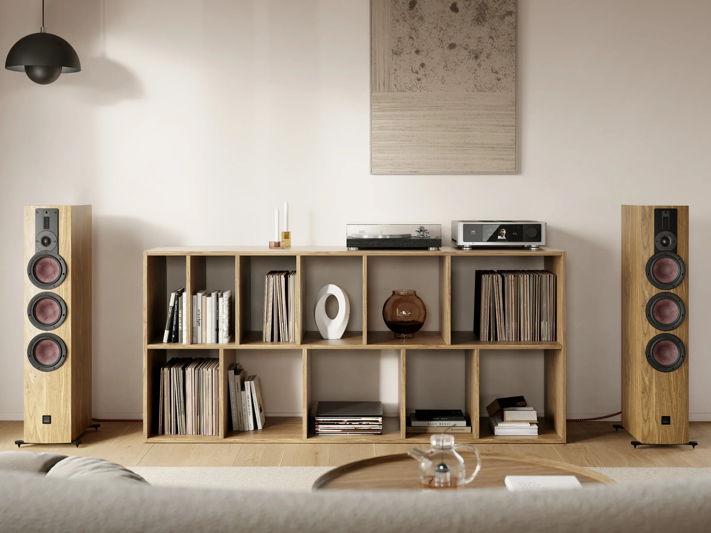 DALI Rubikore 8 passive floorstanding speaker with sleek black finish and modern design, shown in a stylish home audio setup.