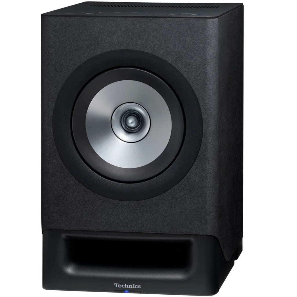 Black Technics SC-CX700 active bookshelf speakers with a sleek front grille and modern design, ready for high-quality audio.