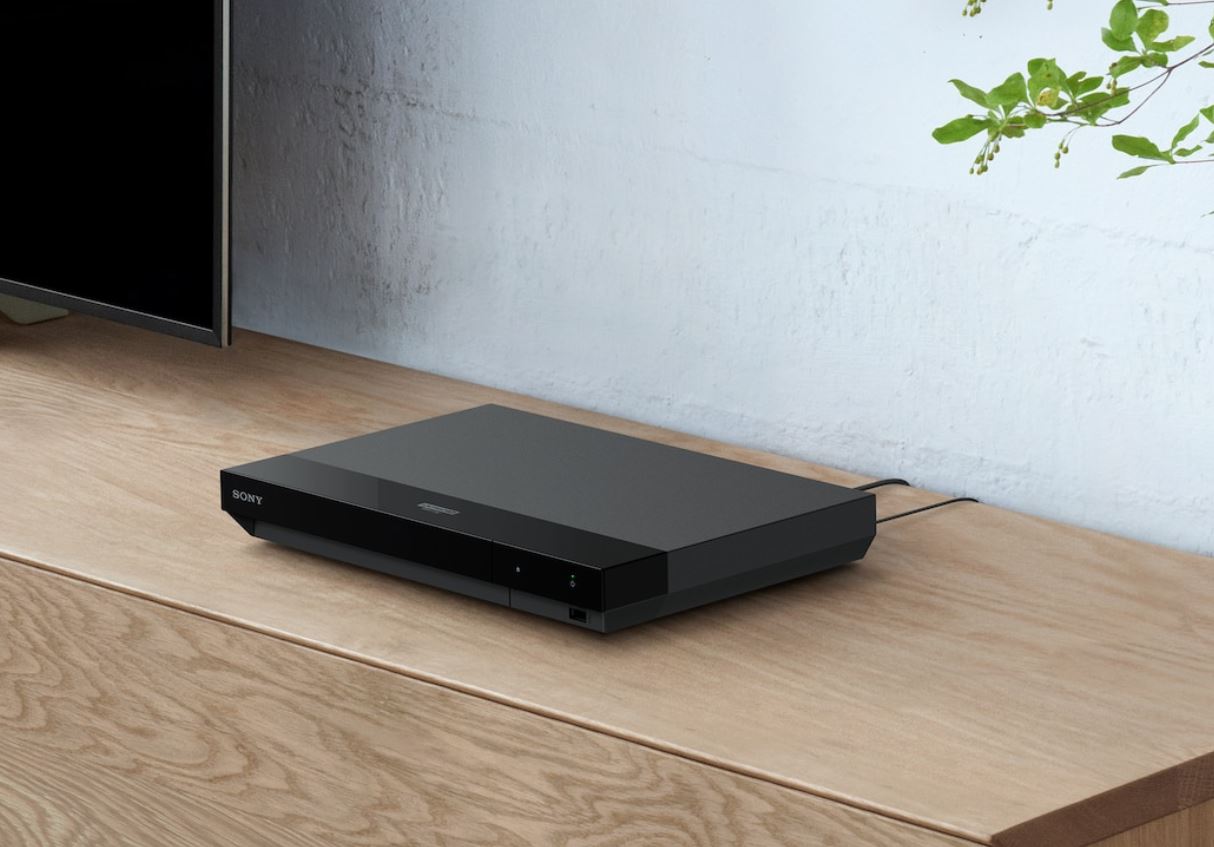 Sony UBP-X700 CD player front view with sleek design and control buttons, showcasing high-quality audio playback.