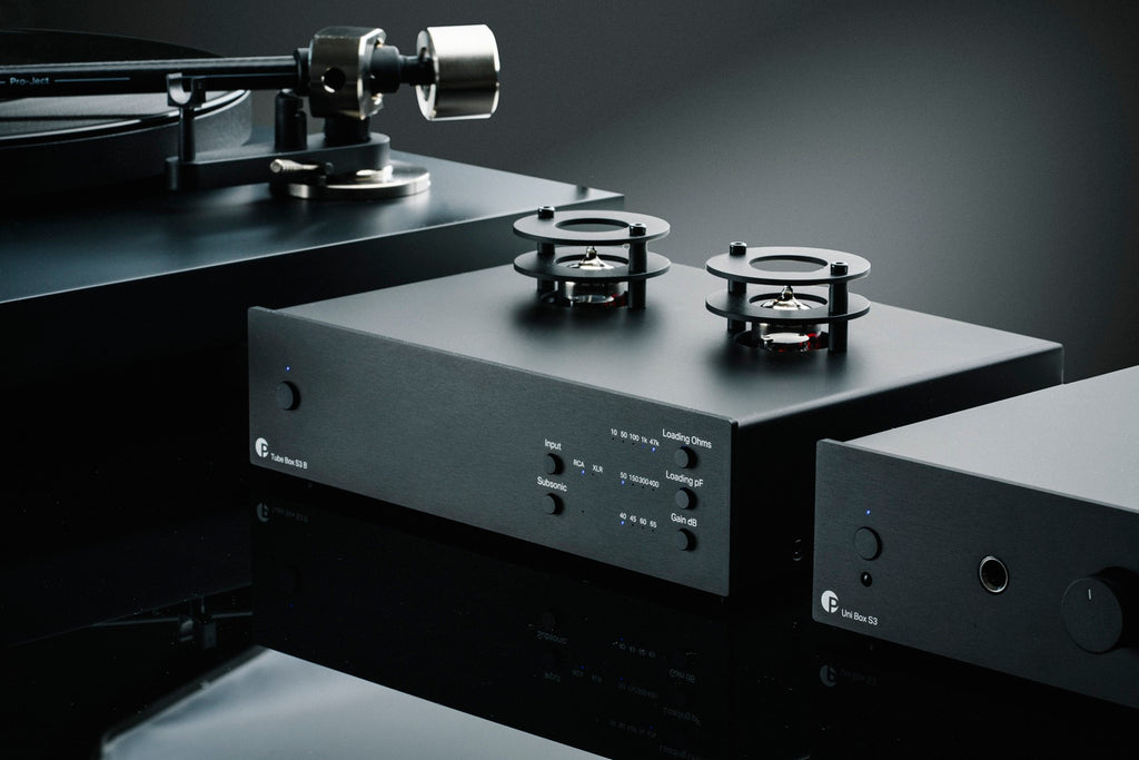 Pro-Ject Tube Box S3 B phono preamp with sleek design, featuring tubes and controls, ideal for high-quality vinyl playback.