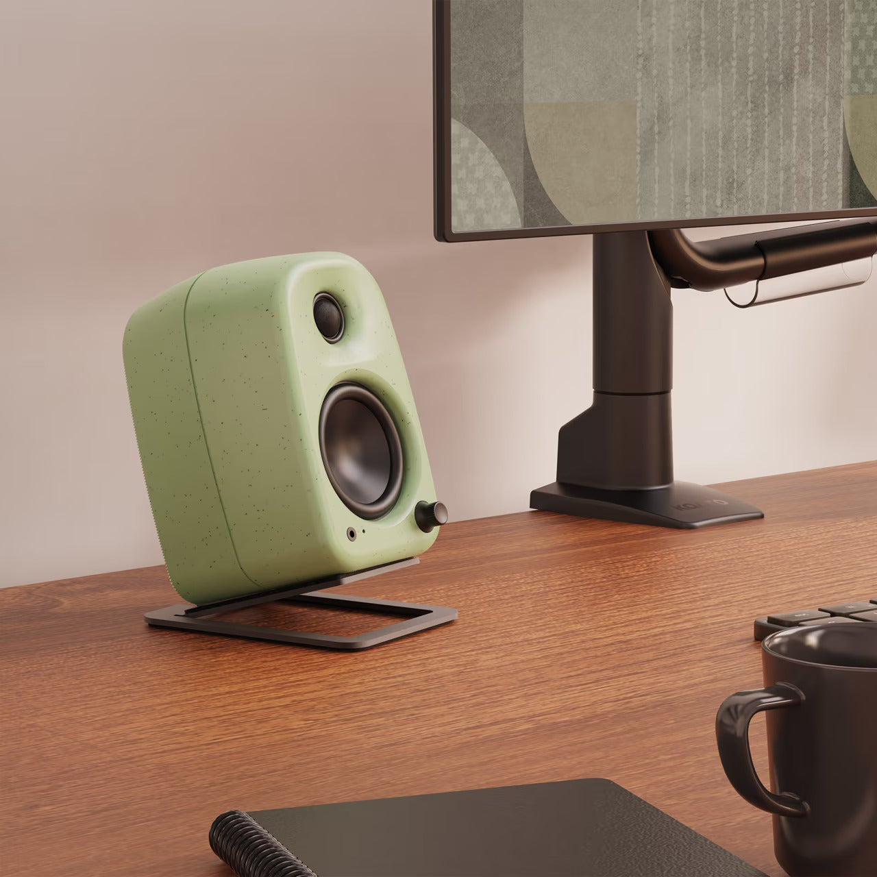 Close-up of Kanto Audio UKI desktop speakers showcasing their sleek design and premium finish.