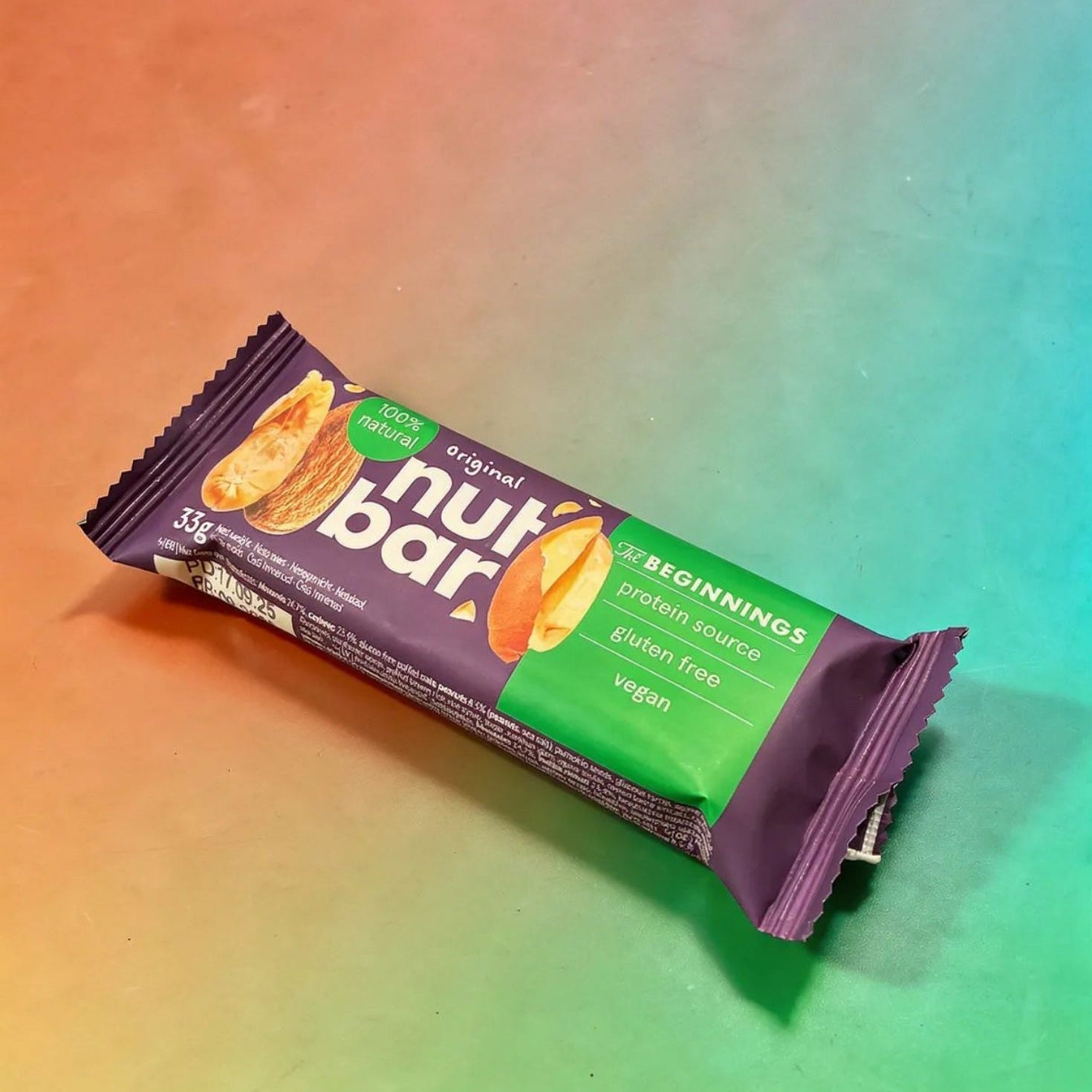 Nut bar packaging on a gradient background