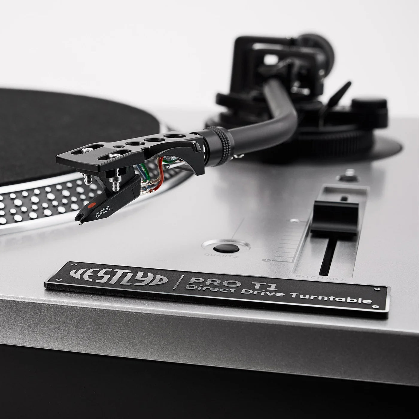 Vestlyd Vestlyd Pro T1 DJ turntables with sleek black design, featuring tonearm and control buttons for professional audio mixing.