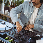 Allen & Heath Xone:24 DJ mixer with multiple knobs and faders, professional audio equipment for DJs and mixing setups.