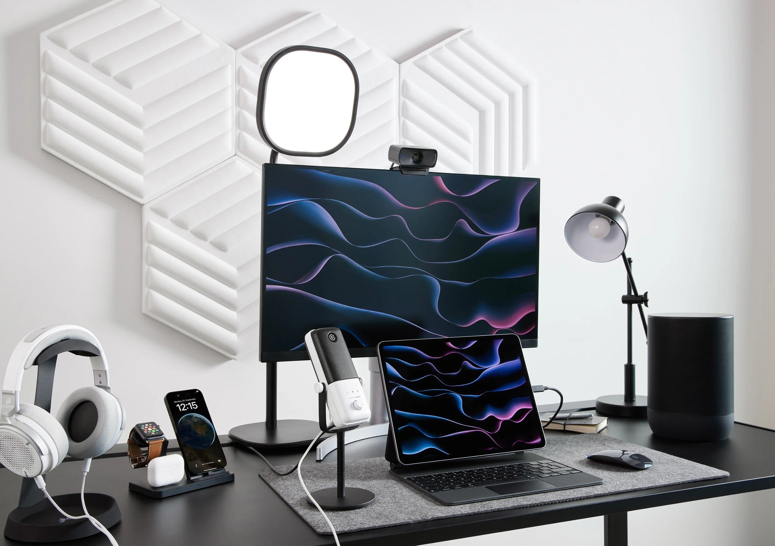 Elgato Facecam MK2 video camera mounted on a desk, showcasing its sleek design and professional setup for streaming or recording.