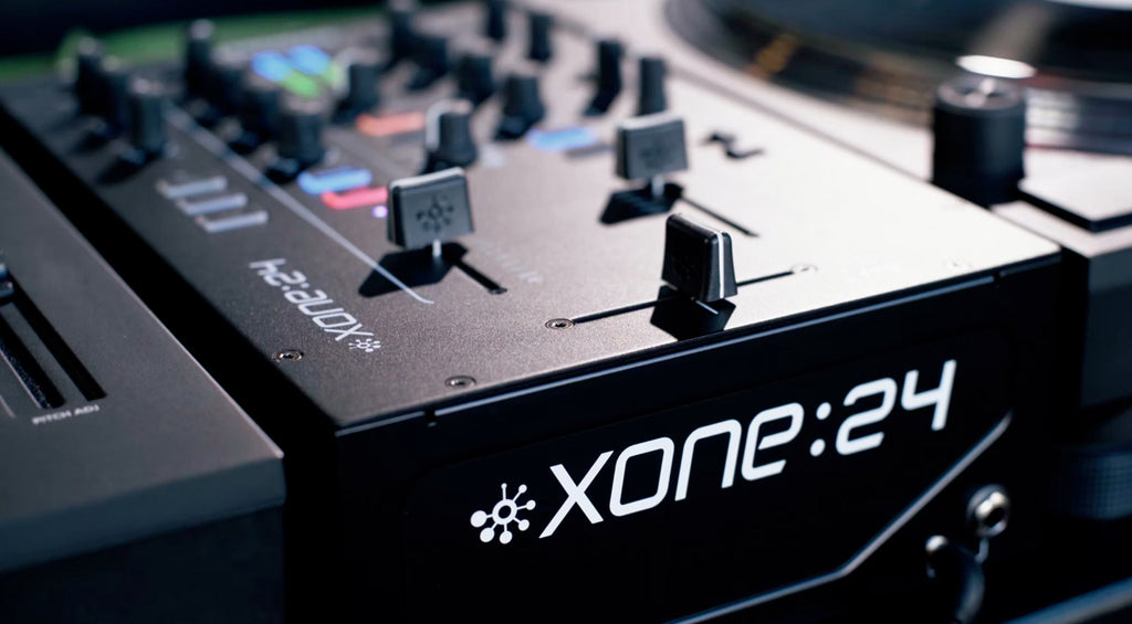Allen & Heath Xone:24 DJ mixer with dual channel strips, EQ controls, and professional audio interface for DJs.